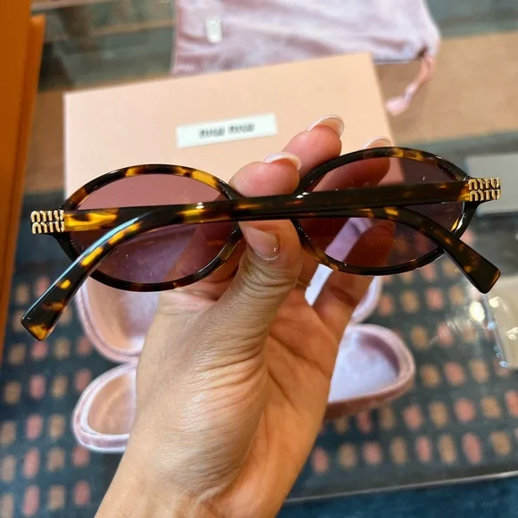 Miu Miu Tortoiseshell Sunglasses with Purple Lenses - Picture 5 of 7